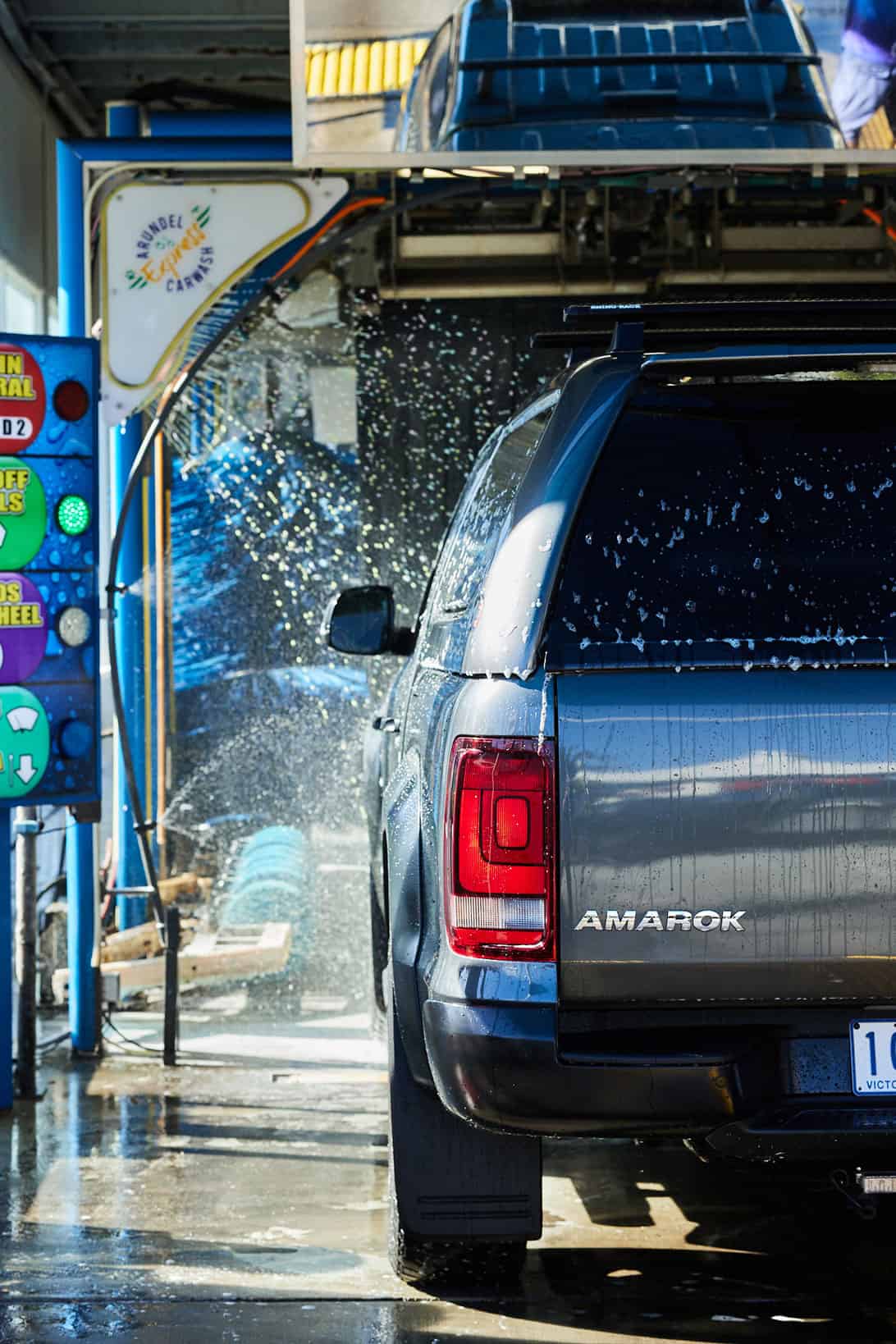 Detail of a car being washed at a Touch-free Car Lovers Car wash