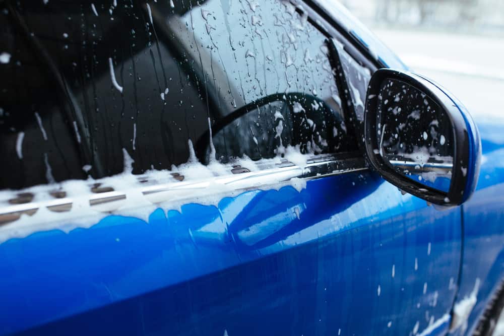 Close-up of a car going through a Car Lovers Express car wash